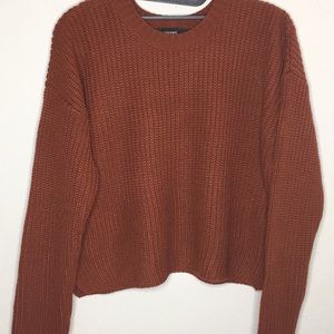 Medium brown colored sweater